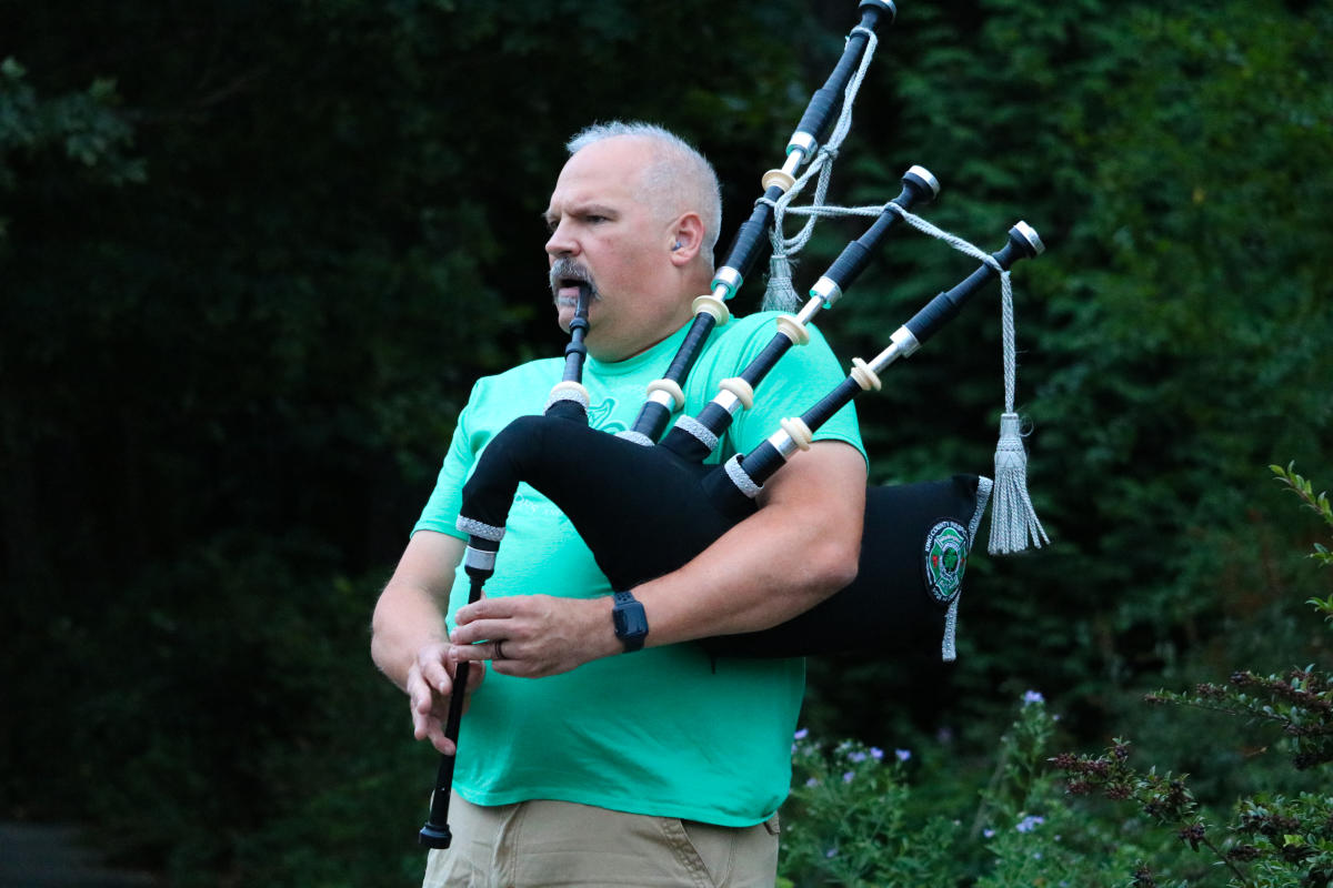 The Lone Piper: Embodying the profound emotional and communal resonance of bagpipe music.